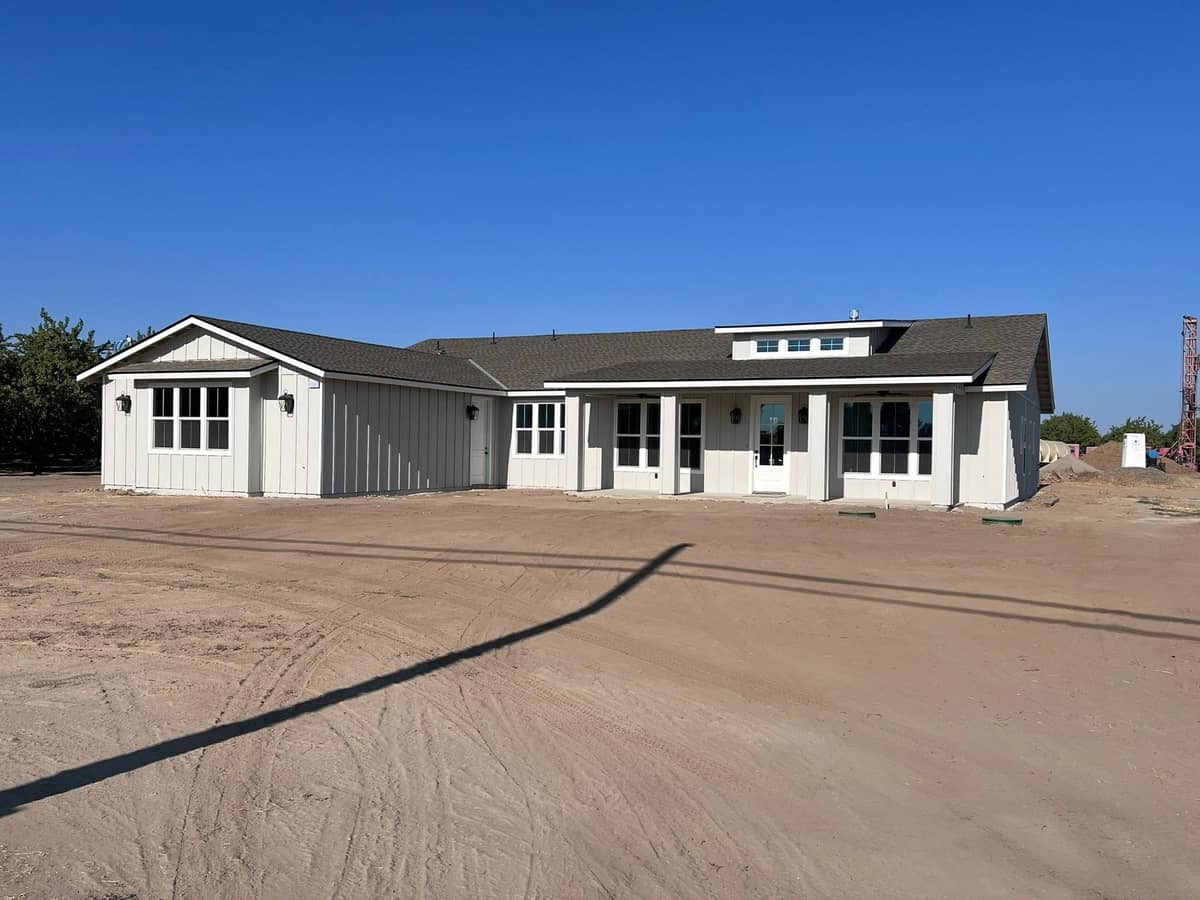 Completed white board and batten farmhouse style home